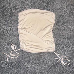 Express nude tube top with tie sides, comes with removable straps